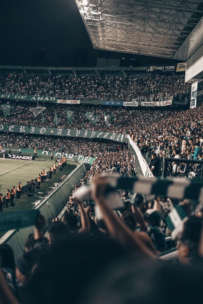 Fans in the stands at a football stadium